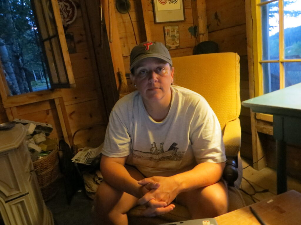 Janice, pensive, relaxed.